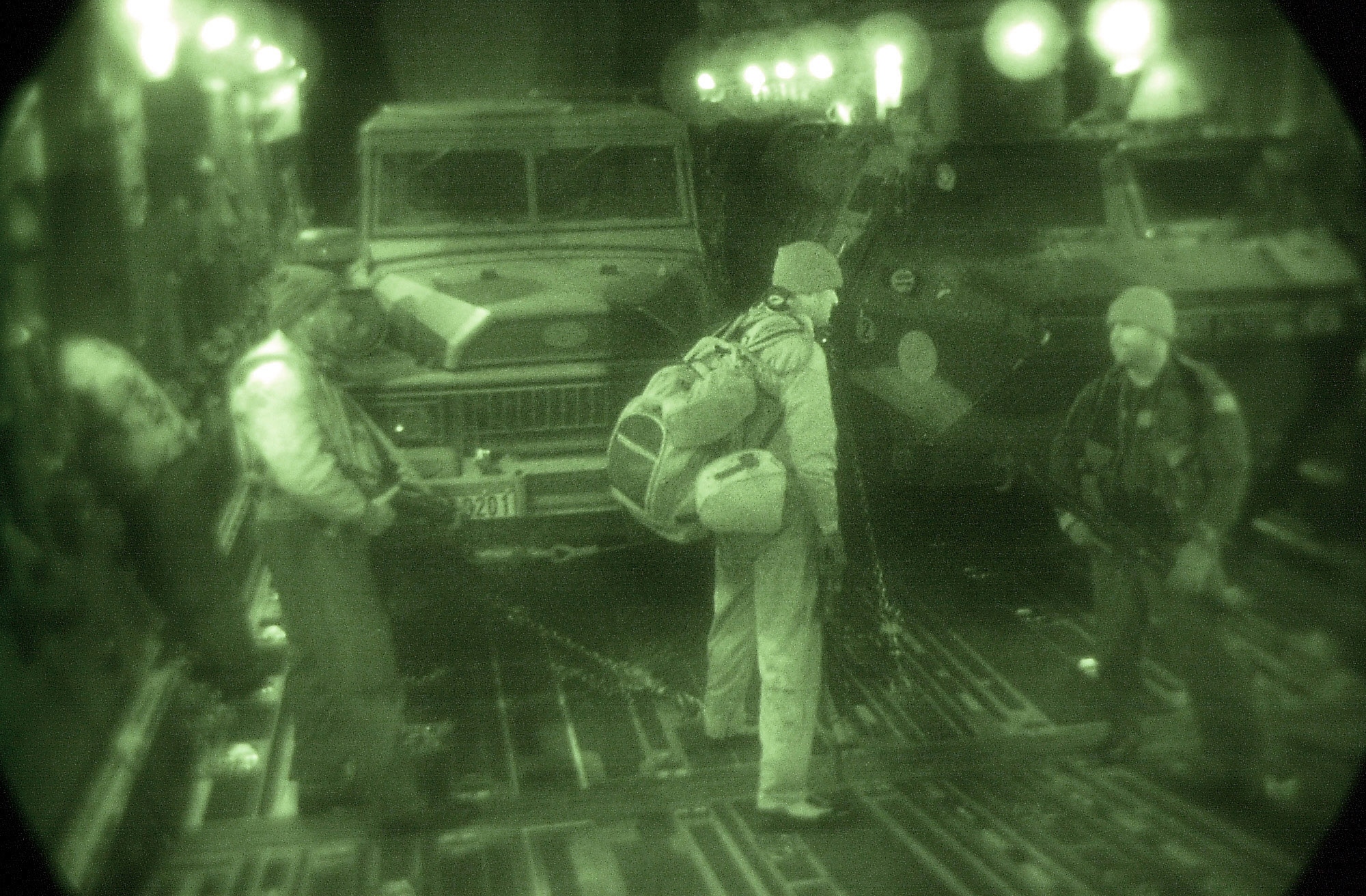 OPERATION ENDURING FREEDOM -- Having landed at a remote air base in Afghanistan, four Air Force Security Forces RAVENs prepare to exit from the rear of a C-17A Globemaster III. The team will provided security for the aircraft and personnel. This mission was the first deployment of French soldiers and over 1,000 tons of security equipment as part of Operation Enduring Freedom.
(U.S. Air Force photo by Master Sgt. Keith Reed) 
