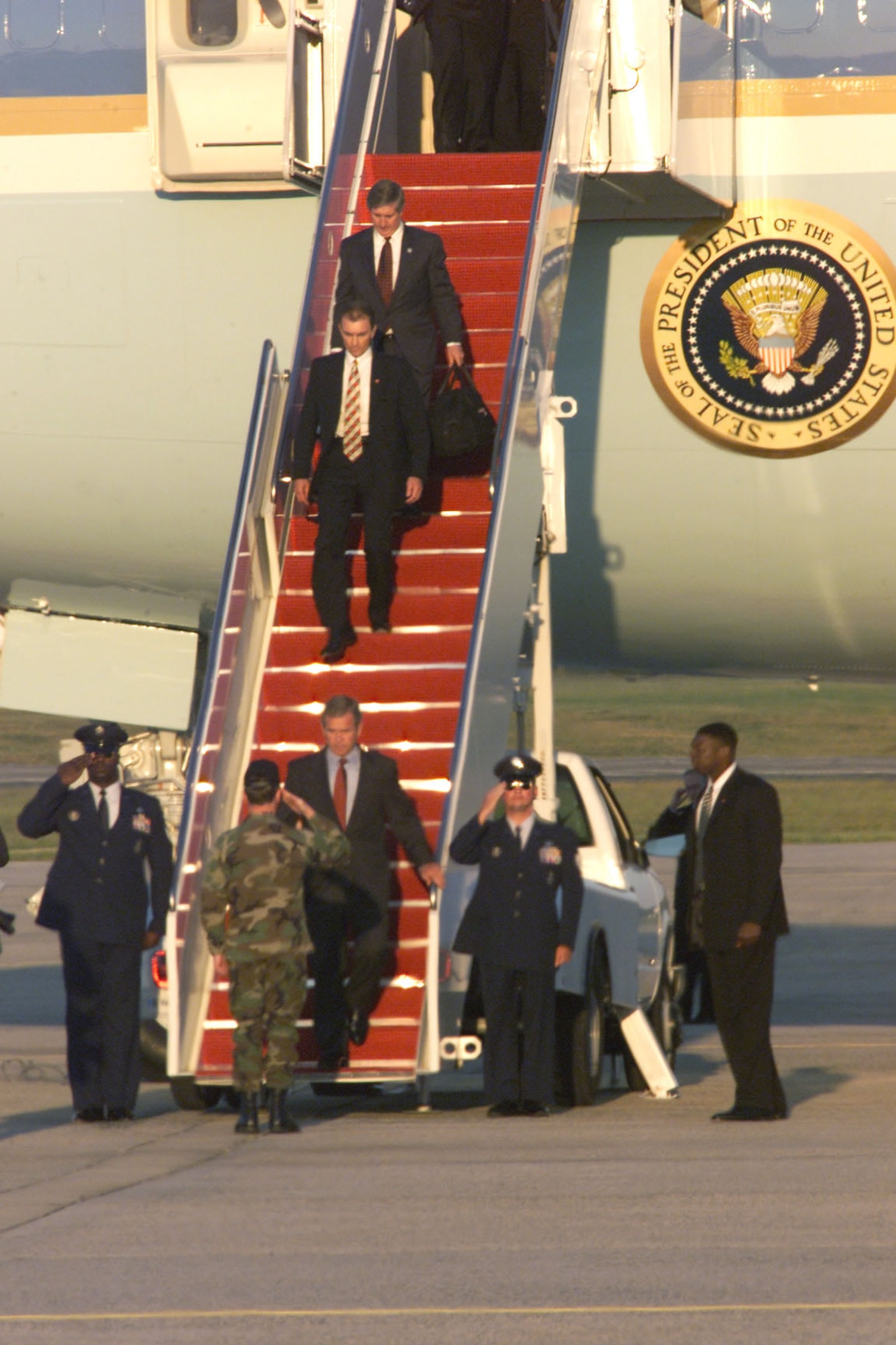 President George W. Bush returns to Andrews Air Force Base, Md., on Sept. 11, 2001, from Offutt Air Force Base, Neb. The president was in Florida when he learned of the terrorist attack on the Pentagon. According to the Air Mobility Command History Office, tankers refueled fighters providing cover for Air Force One as the president moved from Florida. By Sept. 12, tankers also flew air refueling missions for the E-4B National Airborne Operations Center, the president's airborne command and control center. (U.S. Air Force photo/Senior Airman Neal X. Joiner) 