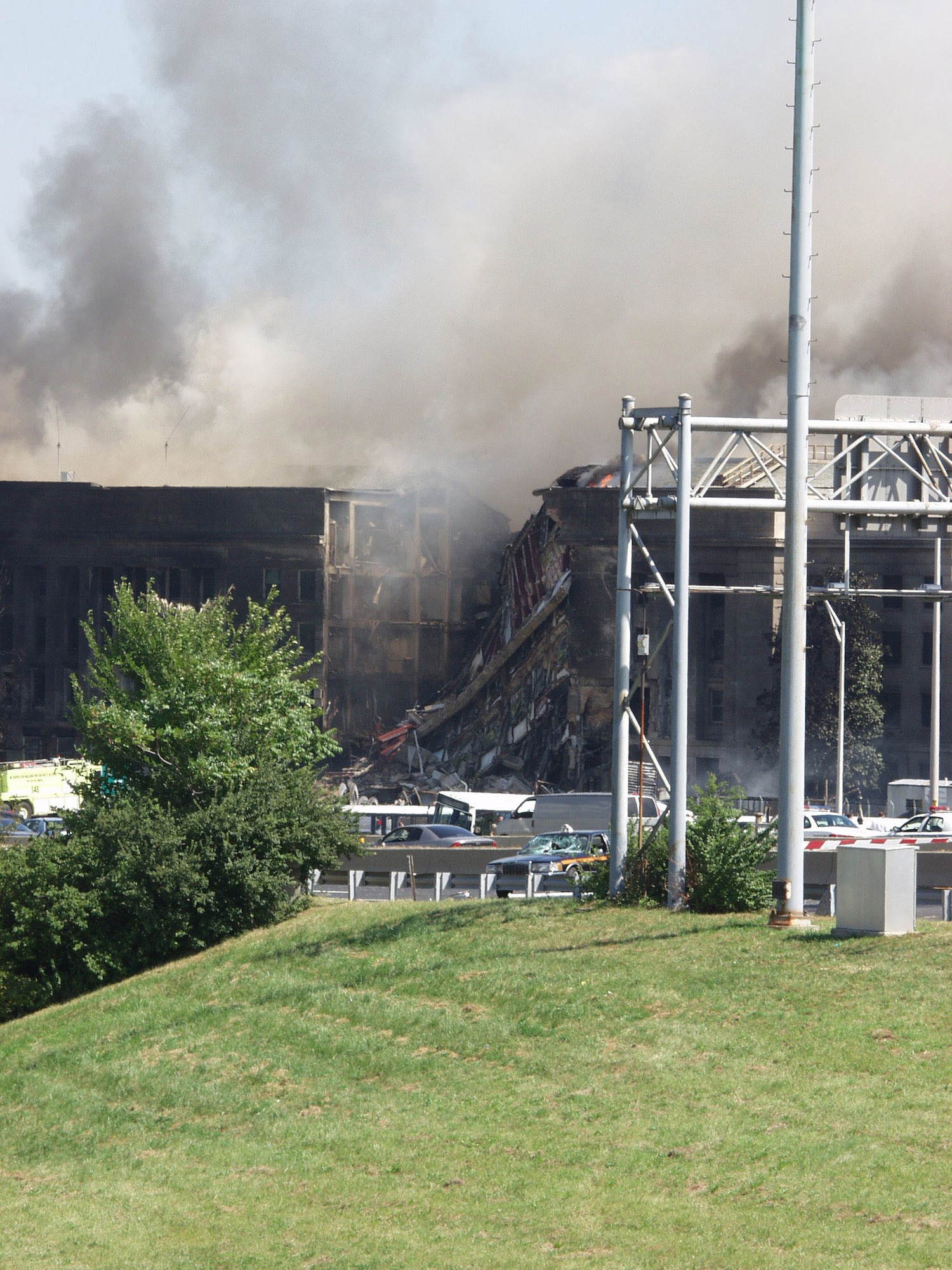 WASHINGTON -- A section of the Pentagon was destroyed when the building was struck by a hijacked commercial airliner on Sept. 11, 2001.  Injured workers were treated or taken to area hospitals, while firefighters tried to extenguish flames.  (U.S. Air Force photo by  Staff Sgt. Gary Coppage)
