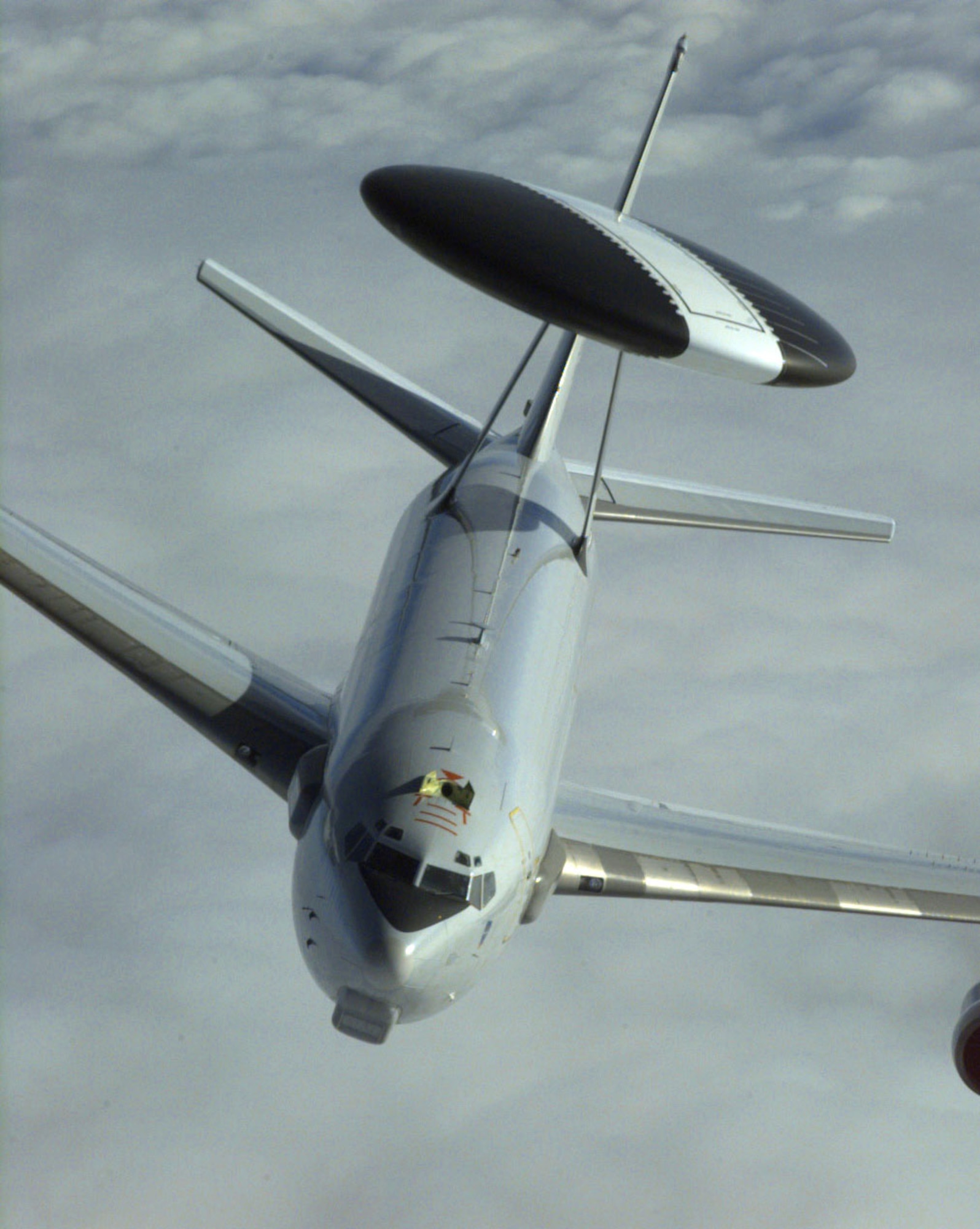 FILE PHOTO -- The E-3 Sentry is a modified Boeing 707/320 commercial airframe with a rotating radar dome. The dome is 30 feet in diameter, 6 feet thick and is held 11 feet above the fuselage by two struts. It contains a radar subsystem that permits surveillance from the Earth's surface up into the stratosphere, over land or water. The radar has a range of more than 200 miles for low-flying targets and farther for aerospace vehicles flying at medium to high altitudes.
(U.S. Air Force photo by Master Sgt. Joe Cupido)