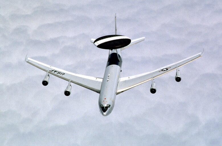 FILE PHOTO -- An E-3 Sentry approaches a KC-10A Extender for aerial refueling June 29, 2000. The E-3 Sentry is an airborne warning and control system aircraft that provides all-weather surveillance, command, control and communications needed by commanders of U.S. and NATO air defense forces. The E-3 Sentry is modified Boeing 707/320 commercial airframe with a rotating radar dome. The dome is 30 feet in diameter, 6 feet thick and is held 11 feet above the fuselage by two struts. It contains a radar subsystem that permits surveillance from the Earth's surface up into the stratosphere, over land or water. The radar has a range of more than 200 miles for low-flying targets and farther for aerospace vehicles flying at medium to high altitudes. (U.S. Air Force photo by Gary Ell)
