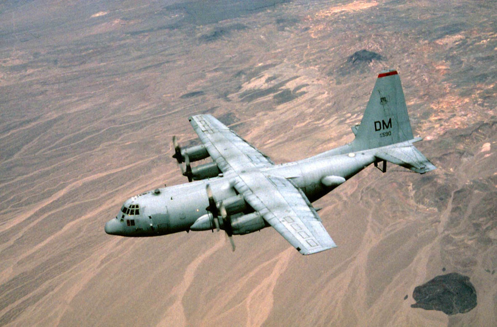 FILE PHOTO -- Compass Call is the designation for a modified version of Lockheed corporation's EC-130H Hercules aircraft configured to perform tactical command, control and communications countermeasures. Specifically, the modified aircraft uses noise jamming to prevent communication or degrade the transfer of information essential to command and control of weapon systems and other resources. It primarily supports tactical air operations but also can provide jamming support to ground force operations. Modifications to the aircraft include an electronic countermeasures system, air refueling capability and associated navigation and communications systems. (U.S. Air Force Photo) 