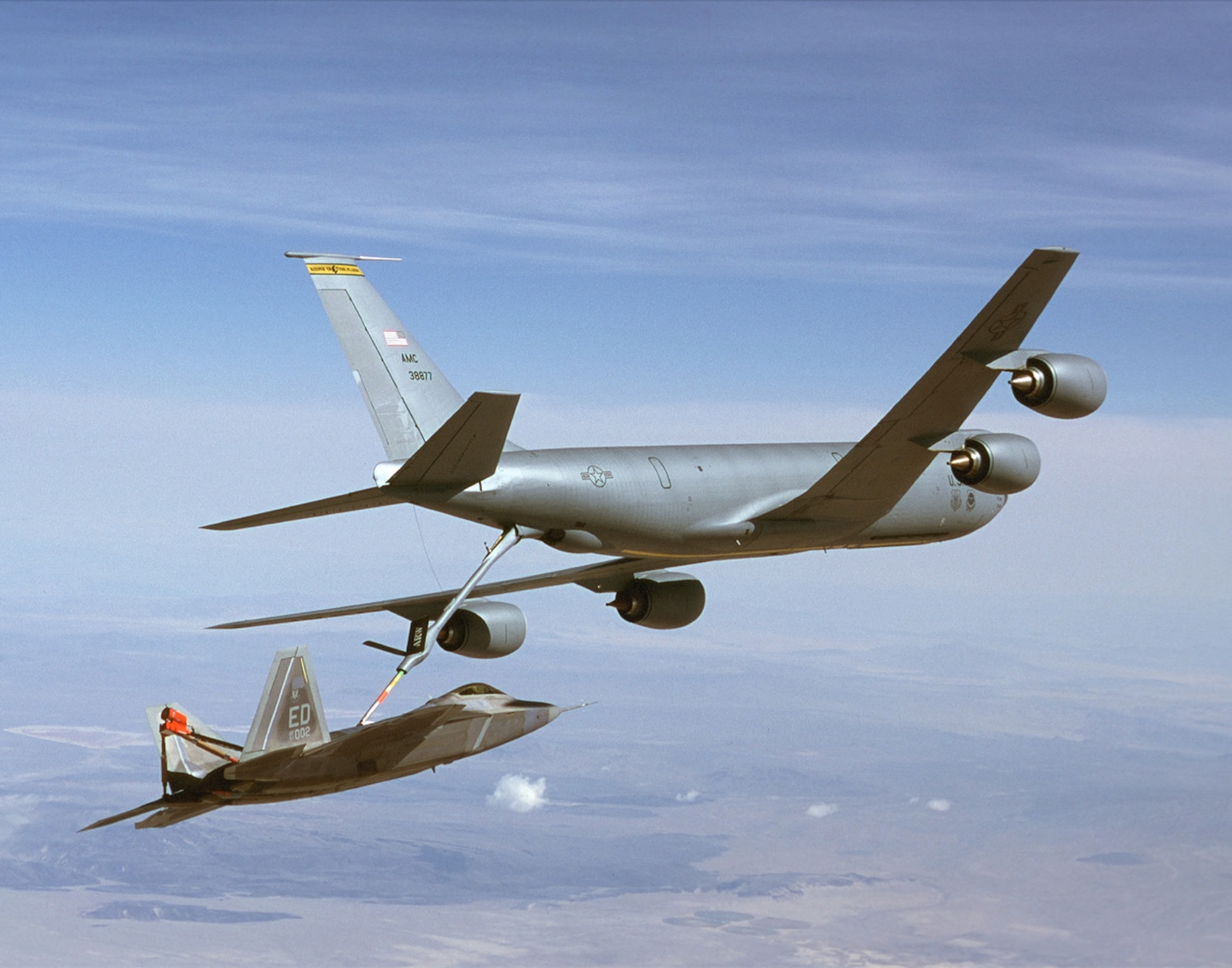 FILE PHOTO -- A KC-135R Stratotanker refuels an F/A-22 Raptor. The KC-135's principal mission is air refueling. This asset greatly enhances the U. S. Air Force's capability to accomplish its mission of Global Engagement.
(U.S. Air Force photo by Kevin Robertson) 
