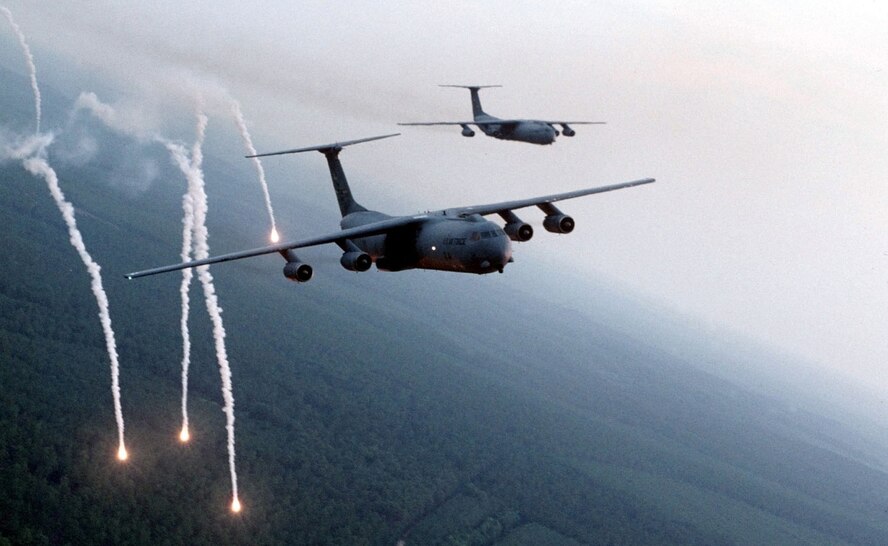 FILE PHOTO -- The C-141B Starlifter is the workhorse of the Air Mobility Command. The Starlifter fulfills the vast spectrum of airlift requirements through its ability to airlift combat forces over long distances, deliver those forces and their equipment either by air, land or airdrop, resupply forces and transport the sick and wounded from the hostile area to advanced medical facilities. The C-141 force, nearing nine million flying hours, has a proven reliability and long-range capability. In addition to training, worldwide airlift and combat support, the C-141 has amassed a laudatory record in response to humanitarian crises. The C-141, with its changeable cargo compartment, can transition from rollers on the floor for palletized cargo to a smooth floor for wheeled vehicles to aft facing seats or sidewall canvas seats for passengers, quickly and easily, to handle over 30 different missions. (U.S. Air Force photo by Senior Airman Greg Davis) 
