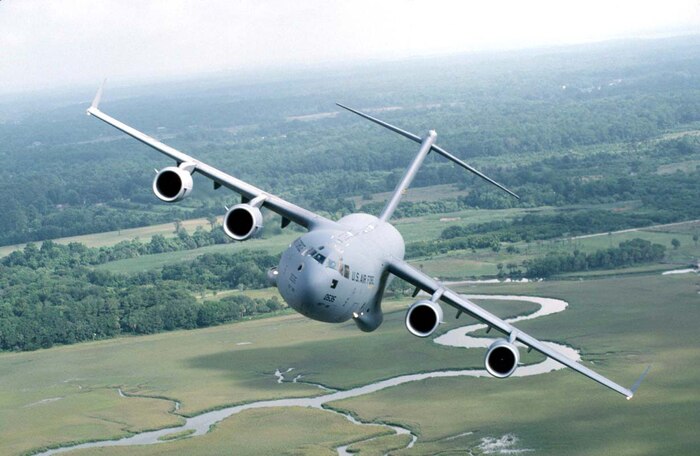 FILE PHOTO -- The C-17 Globemaster is the most flexible airlift aircraft to enter the Air Force's inventory. The ultimate measure of airlift effectiveness is the ability to rapidly project and sustain an effective combat force close to a potential battle area. Threats to U. S. interests have changed in recent years, and the size and weight of U.S. mechanized firepower and equipment have grown in response to improved capabilities of potential adversaries. This trend has significantly increased air mobility requirements, particularly in the area of heavy outsized cargo. As a result, additional airlift is needed to meet possible contingencies worldwide. The C-17 helps address these shortfalls in the current airlift force. The aircraft is operated by the Air Mobility Command with initial operations at Charleston Air Force Base, S.C., with the 437th Airlift Wing and the 315th Airlift Wing, Air Force Reserve. (U.S. Air Force photo by Technical Sgt. John McDowell)

