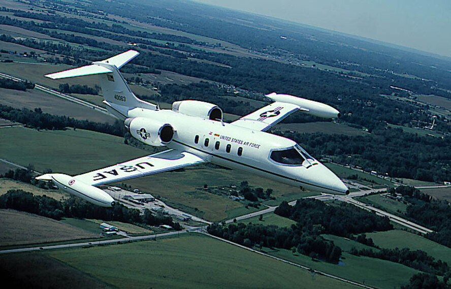 FILE PHOTO -- The C-21A provides cargo and passenger airlift and can transport litters during medical evacuations. The C-21A's turbofan engines are pod-mounted on the sides of the rear fuselage. The swept-back wings have hydraulically actuated, single-slotted flaps. The aircraft has a retractable tricycle landing gear, single steerable nose gear and multiple-disc hydraulic brakes. The C-21A can carry eight passengers and 42 cubic feet (1.26 cubic meters) of cargo. The fuel capacity ofthe C-21A is 931 gallons (3,537.8 liters) carried in wingtip tanks. The safety and operational capabilities of the C-21A areincreased by the autopilot, color weather radar and tactical air navigation (TACAN) system, as well as HF, VHF and UHF radios. (U.S. Air Force photo)
