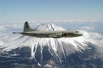 Misawa, Japan (Feb. 13, 2003) -- A P-3C Orion assigned to the Golden Eagles of Patrol Squadron Nine (VP-9) circles Mt. Fuji.  VP-9 is forward deployed to Misawa, Japan.