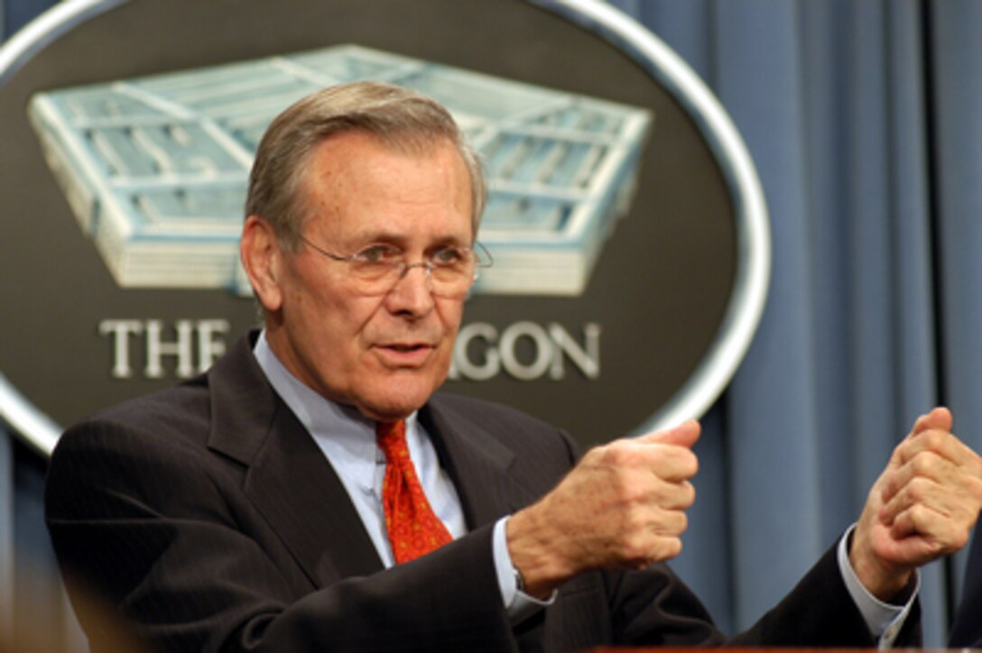 Secretary of Defense Donald H. Rumsfeld quotes President Bush in commenting about the work of U.N. weapons inspectors in Iraq during the Pentagon press briefing on Jan. 15, 2003. Bush said, "Inspectors do not have the duty or the ability to uncover terrible weapons hidden in a vast country. The responsibility of inspectors is simply to confirm evidence of voluntary and total disarmament. Saddam Hussein has the responsibility to provide that evidence, as directed, and in full." 