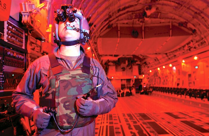 OPERATION ENDURING FREEDOM -- Staff Sgt. Michael, a C-17 loadmaster, from the 701st Airlift Squadron, Charleston Air Force Base, S.C., helps keep troops and supplies heading downrange for Operation Enduring Freedom.  (U.S. Air Force photo by Master Sgt. Keith Reed)