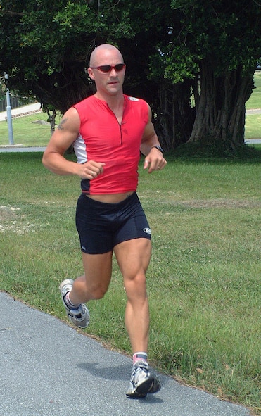 KADENA AIR BASE, Japan -- Shawn Hnatko trains here for the Ironman Triathlon World Championships in Hawaii on Oct. 18.  During the competition, he will swim 2.4 miles, bike 112 miles and run a 26.2-mile marathon.  (U.S. Air Force photo by Master Sgt. Michael Farris)
