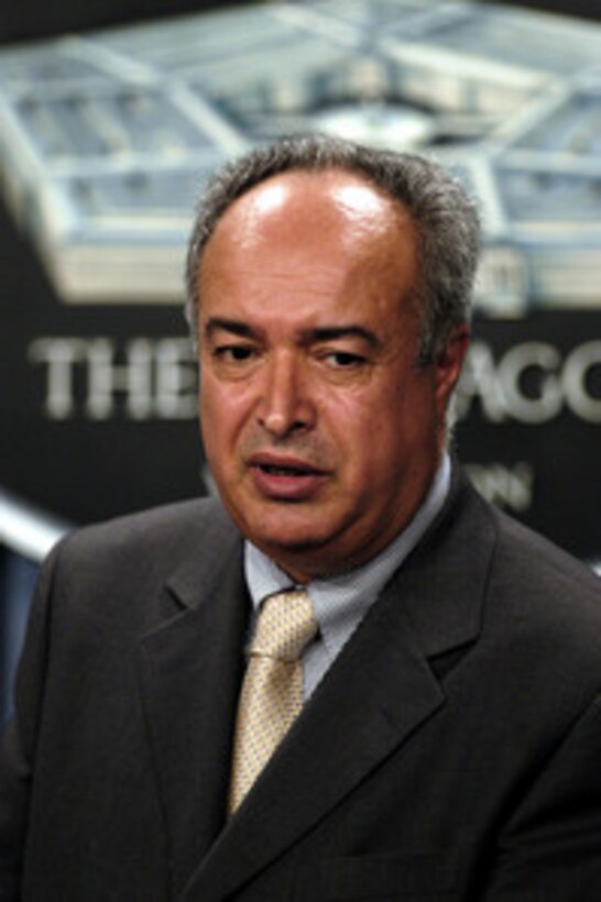 Emad Dhia, director, Iraqi Reconstruction and Development Council, and Founder, Iraqi Forum for Democracy, listens to a reporter's question during a Pentagon press briefing on July 7, 2003. 