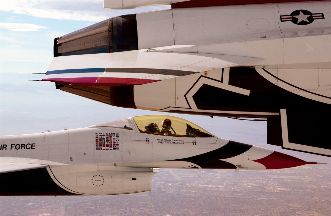 NELLIS AIR FORCE BASE, Nev. -- Capt. Mark Smith, Thunderbird Two, concentrates on maintaining his left-wing position. Pilots in diamond formation must overcome the natural tendency to look at the ground and instead devote full attention to the lead aircraft.  (U.S. Air Force photo by Staff Sgt. Sean White)