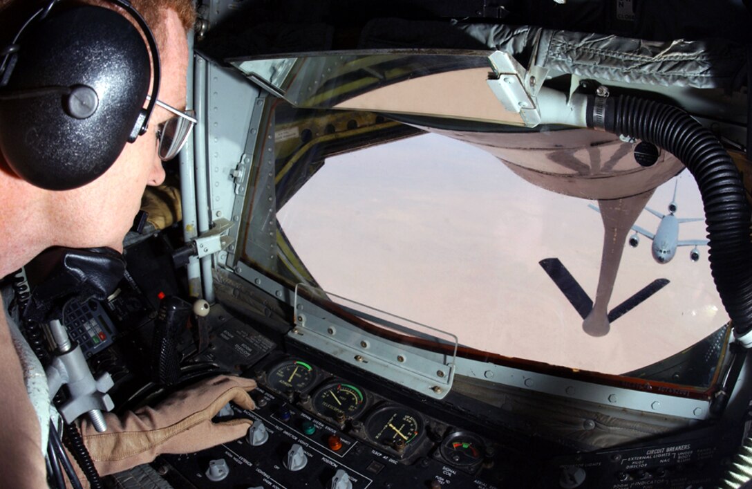 OPERATION IRAQI FREEDOM -- Master Sgt. Sam Blackwell prepares to transfer fuel to a KC-10 Extender.  He is a boom operator on a KC-135 Stratotanker deployed from Pease Air National Guard Base, N.H.  (U.S. Air Force photo by Master Sgt. Terry L. Blevins)