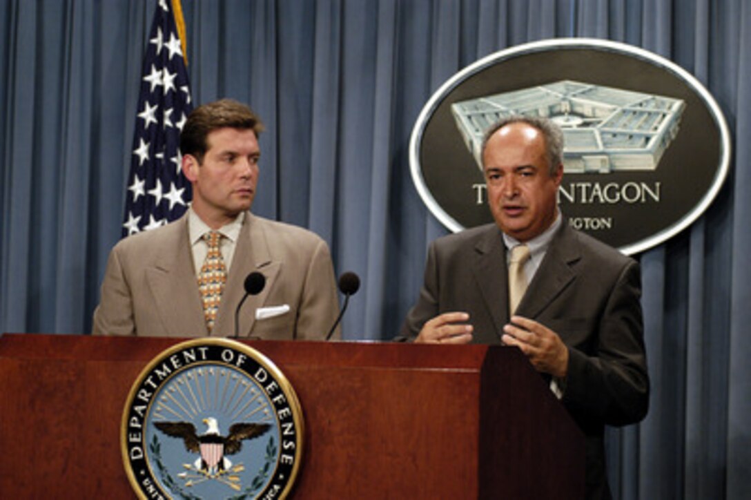 Emad Dhia, director, Iraqi Reconstruction and Development Council, and Founder, Iraqi Forum for Democracy, responds to a reporter's question during a Pentagon press briefing on July 7, 2003. Dhia is accompanied by Special Assistant to the Secretary of Defense Lawrence Di Rita. 