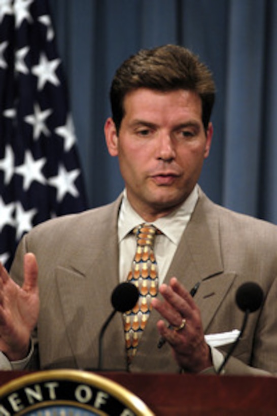 Special Assistant to the Secretary of Defense Lawrence Di Rita responds to a reporter's question during his first Pentagon press briefing on July 7, 2003. Di Rita introduced Emad Dhia, director, Iraqi Reconstruction and Development Council, and Founder, Iraqi Forum for Democracy to address the press and take questions. 