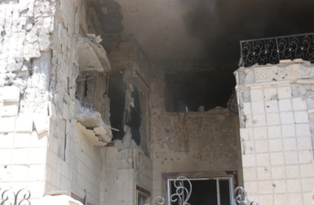 The building that harbored Saddam Hussein's sons Qusay and Uday in Mosul, Iraq, shows the effects of the gun battle between them and soldiers of the Army's 101st Airborne Division (Air Assault) on July 22, 2003. Qusay and Uday were killed in a gun battle as they resisted efforts by coalition forces to apprehend and detain them. 