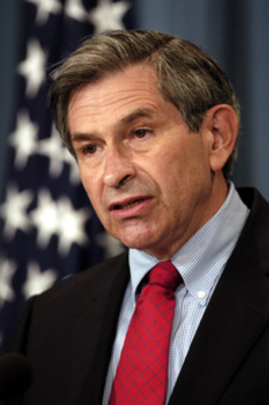 Deputy Secretary of Defense Paul Wolfowitz tells reporters about his trip to Iraq during a Pentagon press briefing on July 23, 2003. Wolfowitz visited with the senior military and civilian leadership and deployed troops in Iraq. 