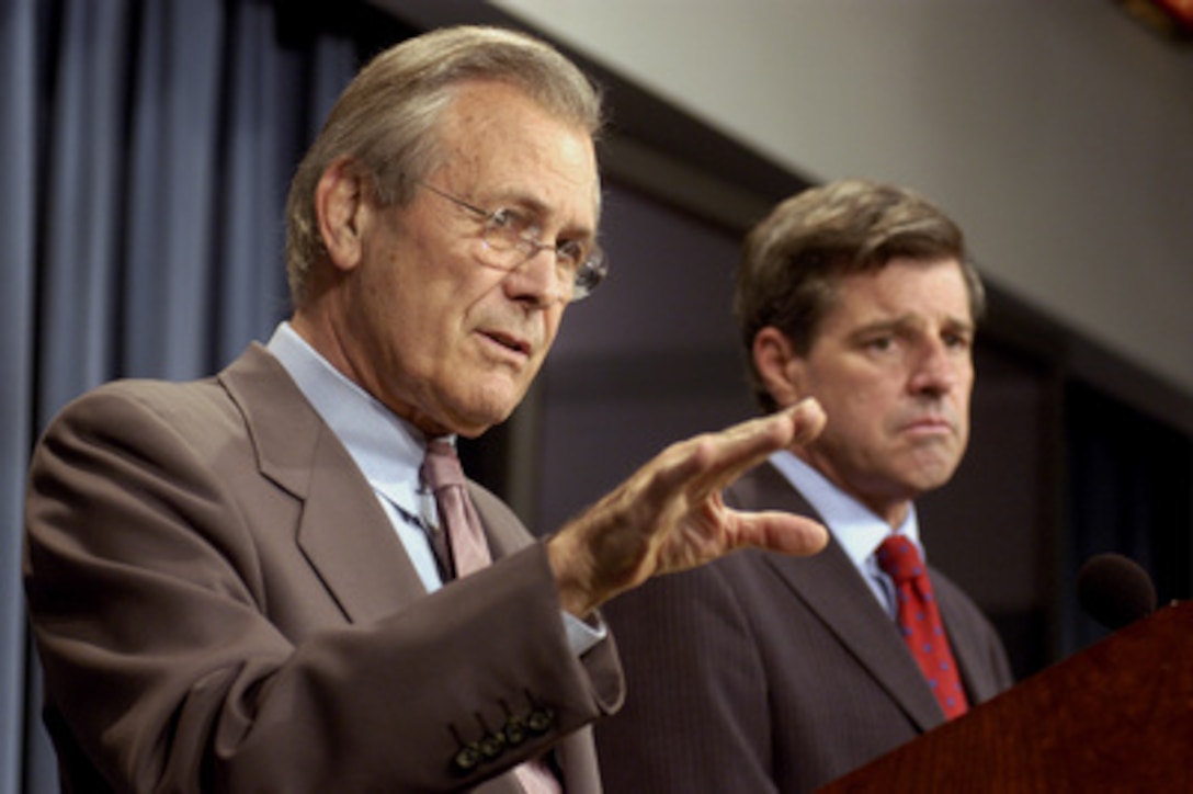 Secretary of Defense Donald H. Rumsfeld gestures to emphasize his point during a press briefing with Ambassador Paul Bremer in the Pentagon on July 24, 2003. Rumsfeld and Bremer briefed reporters about the coalition progress in Iraq. Bremer is the administrator of the Coalition Provisional Authority in Iraq. 