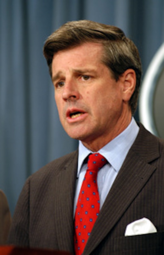 Ambassador Paul Bremer responds to a reporter's question during a press briefing with Secretary of Defense Donald H. Rumsfeld in the Pentagon on July 24, 2003. Bremer and Rumsfeld briefed reporters about the coalition progress in Iraq. Bremer is the administrator of the Coalition Provisional Authority in Iraq. 