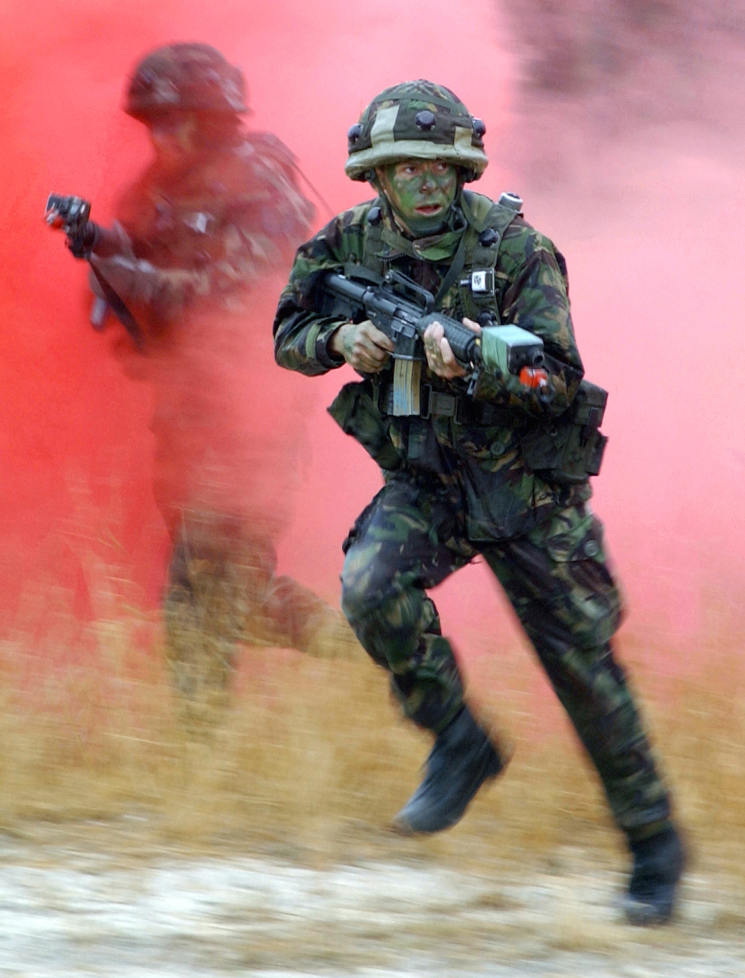 FORT DIX, N.J. -- British explosive ordnance disposal specialists participate in combat scenarios along side their American counterparts during a Phoenix Readiness class.  Air Mobility Command's Phoenix Readiness combat training has ended and will be replaced in October by the Air Force's expeditionary combat-support training program, Eagle Flag.  (U.S. Air Force photo by Staff Sgt. Jeromy Cross)