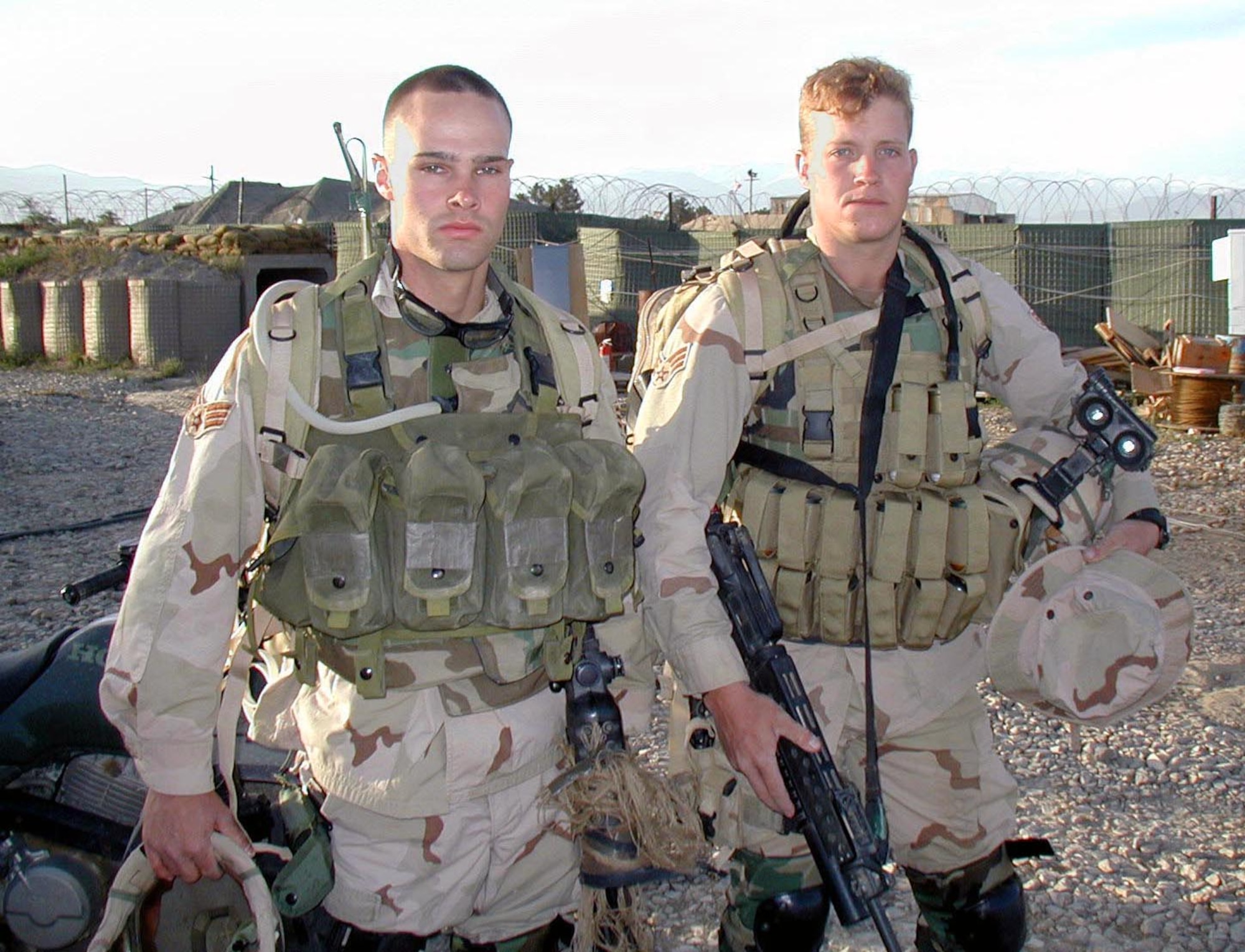 OPERATION ENDURING FREEDOM -- Senior Airmen Luke Allen (left) and Rusty Youngblood, Air Force countersnipers deployed to Bagram Air Base, Afghanistan, got what they call "the chance of a lifetime" June 1 when they embarked on an offensive combat mission with the Army's 82nd Airborne Division.  Allen and Youngblood are deployed from the 820th Security Forces Squadron at Moody Air Force Base, Ga., supporting Operation Enduring Freedom.  (U.S. Air Force photo by Tech. Sgt. Eric M. Grill)