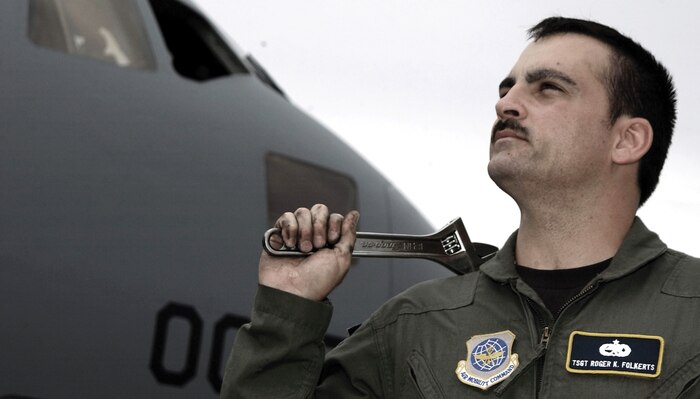 CHARLESTON AIR FORCE BASE, S.C. -- Tech. Sgt. Rodger Folkerts has logged 5,000 hours in the C-17 Globemaster III as a flying crew chief.  This is equal to traveling 2,590,000 miles -- enough to circle Earth more than 104 times.  (U.S. Air Force photo by Airman 1st Class Jason Bailey)