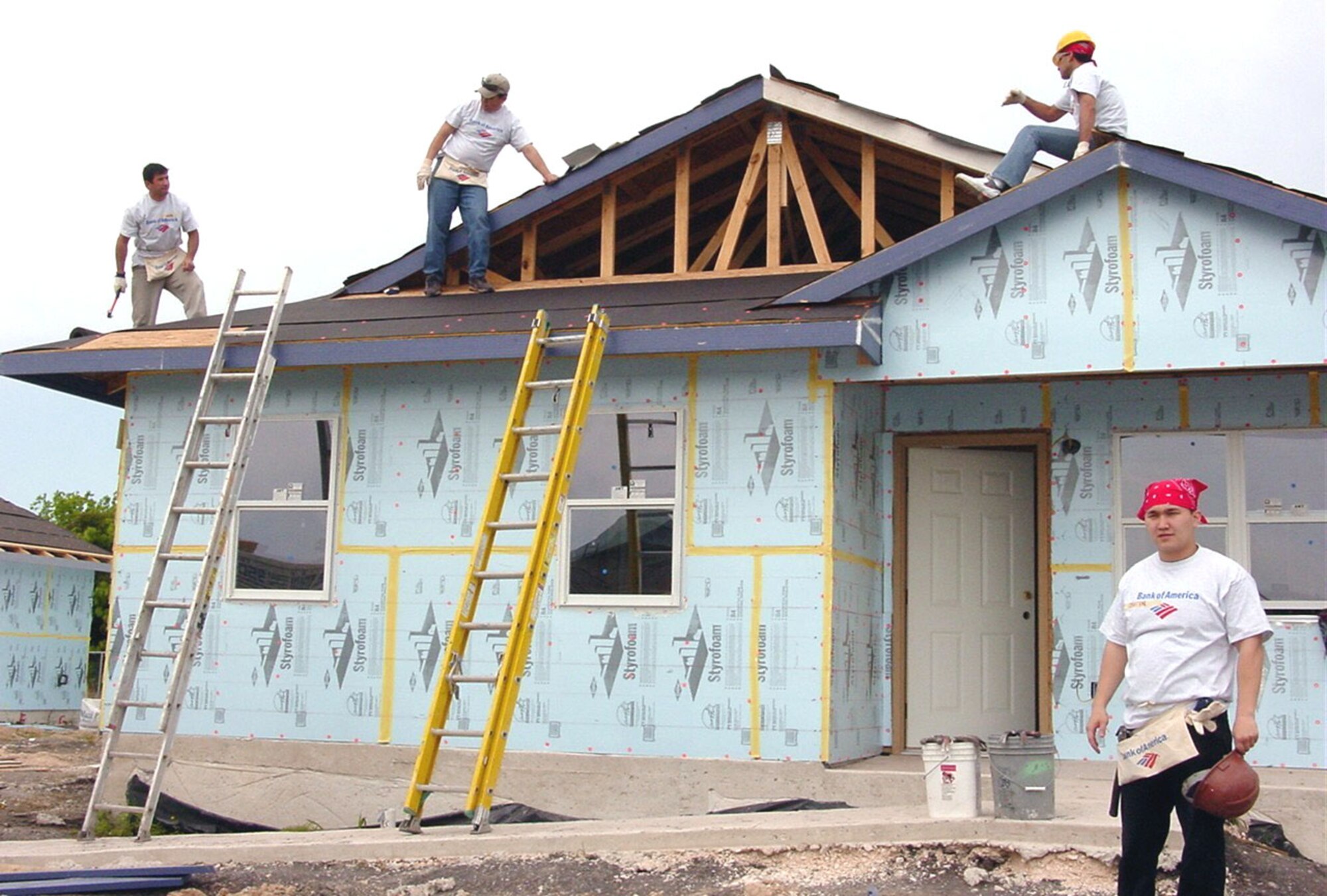 LACKLAND AIR FORCE BASE, Texas -- International military students from the Defense Language Institute English Language Center here volunteered to work on a Habitat for Humanity house construction project.  Thirty-six students from 20 countries set aside their bookwork to participate in the project.  (U.S. Air Force photo by Annette D. Janetzke)
