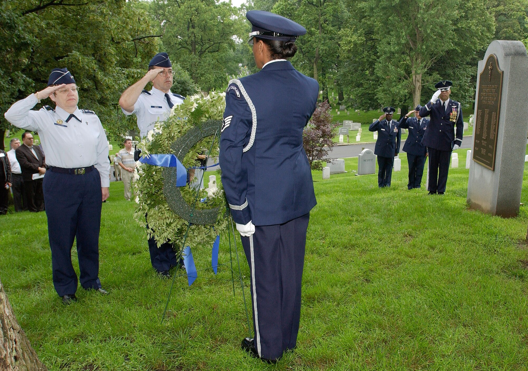 ARLINGTON, Va. (AFPN) -- Chief of Air Force Chaplain Service, Chap. (Maj. Gen.) Lorraine Potter (left), and Chap. (Col.) Darrell Morton salute during a memorial and wreath-laying service at Arlington National Cemetery on June 19.  The NATO chaplains are in the Washington area for a weeklong NATO Allied Air Force Chief of Chaplains Consultative Conference.  (U.S. Air Force photo by Master Sgt. Jim Varhegyi)