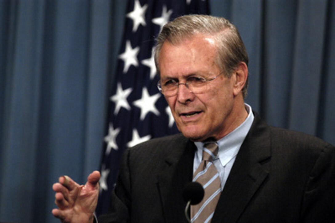 Secretary of Defense Donald H. Rumsfeld responds to a reporter's question during a Pentagon press briefing June 24, 2003. 