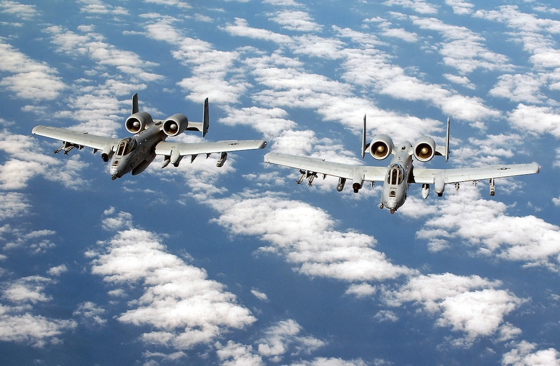 OVER THE MEDITERRANEAN SEA -- A pair of A-10 Thunderbolt IIs from the 104th Fighter Wing, Barnes Municipal Airport, Westfield Mass., Massachusetts Air National Guard, fly over the Mediterranean Sea enroute to a forward operating base.  (U.S. Air Force photo by Master Sgt. Mark Bucher)