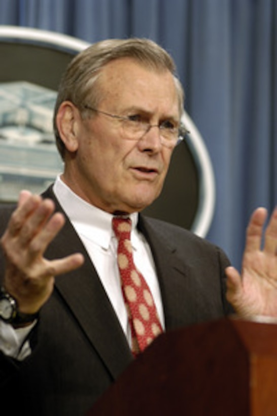 Secretary of Defense Donald H. Rumsfeld responds to a reporter's question during a Pentagon news briefing on Feb. 28, 2003. Chairman of the Joint Chiefs of Staff Gen. Richard B. Myers, U.S. Air Force, joined Rumsfeld at the briefing to give reporters an operational update. 