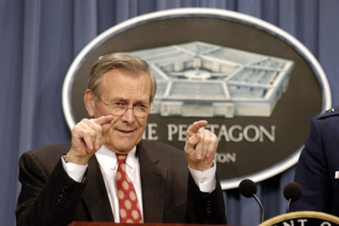 Secretary of Defense Donald H. Rumsfeld responds to a reporter's question during a Pentagon news briefing on Feb. 28, 2003. Rumsfeld commented on the difficulty in predicting the numbers of troops that might be required to occupy and maintain order in a post-war Iraq. Chairman of the Joint Chiefs of Staff Gen. Richard B. Myers, U.S. Air Force, joined Rumsfeld at the briefing to give reporters an operational update. 