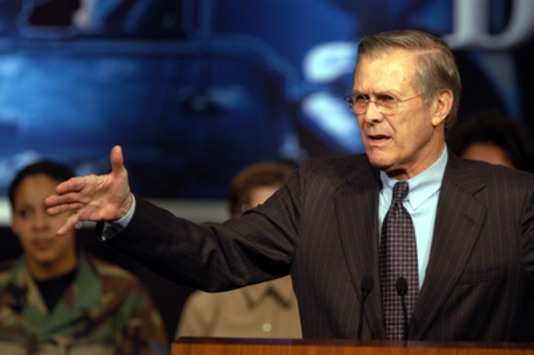 Secretary of Defense Donald H. Rumsfeld delivers his opening remarks to the audience at a town hall meeting in the Pentagon auditorium on March 6, 2003. Rumsfeld then fielded questions from military and civilian Pentagon employees. The forum allows people in the Pentagon to direct their questions to the top man at the Defense Department. 