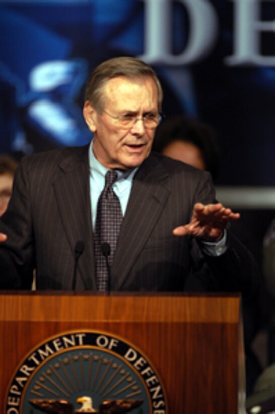 Secretary of Defense Donald H. Rumsfeld delivers his opening remarks to the audience at a town hall meeting in the Pentagon auditorium on March 6, 2003. Rumsfeld then fielded questions from military and civilian Pentagon employees. The forum allows people in the Pentagon to direct their questions to the top man at the Defense Department. 