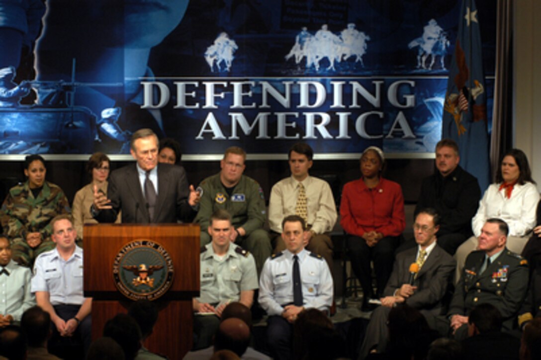 Secretary of Defense Donald H. Rumsfeld answers a question from the audience at a town hall meeting in the Pentagon auditorium on March 6, 2003. Rumsfeld delivered opening remarks then fielded questions from military and civilian Pentagon employees. The forum allows people in the Pentagon to direct their questions to the top man at the Defense Department. 