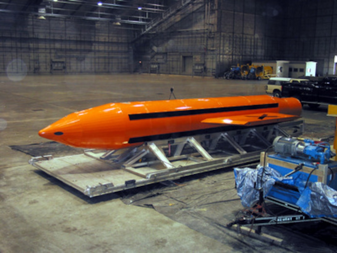 A Massive Ordnance Air Blast (MOAB) weapon is prepared for testing at the Eglin Air Force Armament Center on March 11, 2003. The MOAB is a precision-guided munition weighing 21,500 pounds and will be dropped from a C-130 Hercules aircraft for the test. It will be the largest non-nuclear conventional weapon in existence. The MOAB is an Air Force Research Laboratory technology project that began in fiscal year 2002 and is to be completed this year. 