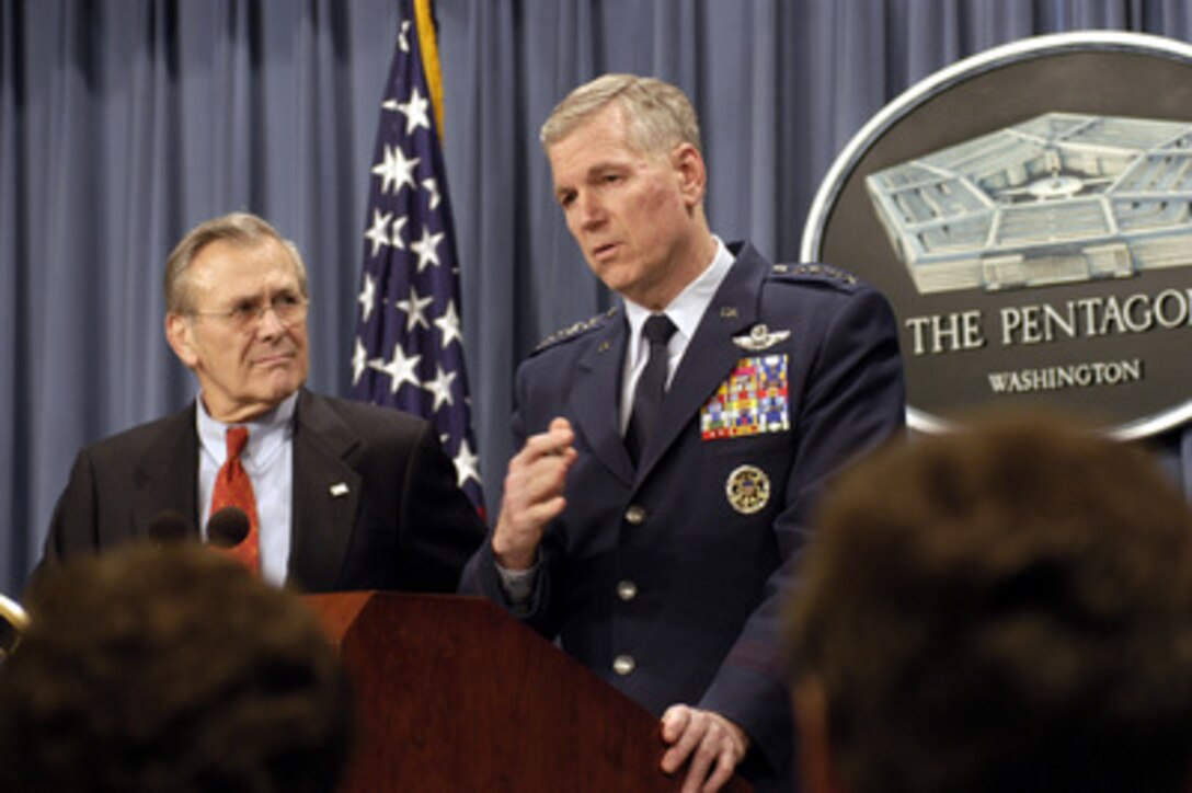 Chairman of the Joint Chiefs of Staff Gen. Richard B. Myers (right), U.S. Air Force, and Secretary of Defense Donald H. Rumsfeld give reporters an operational update in the Pentagon on March 11, 2003. Myers briefed reporters about yesterday's three air strikes in support of Operation Southern Watch, which is the U.S. and coalition enforcement of the no-fly-zone over Southern Iraq. 