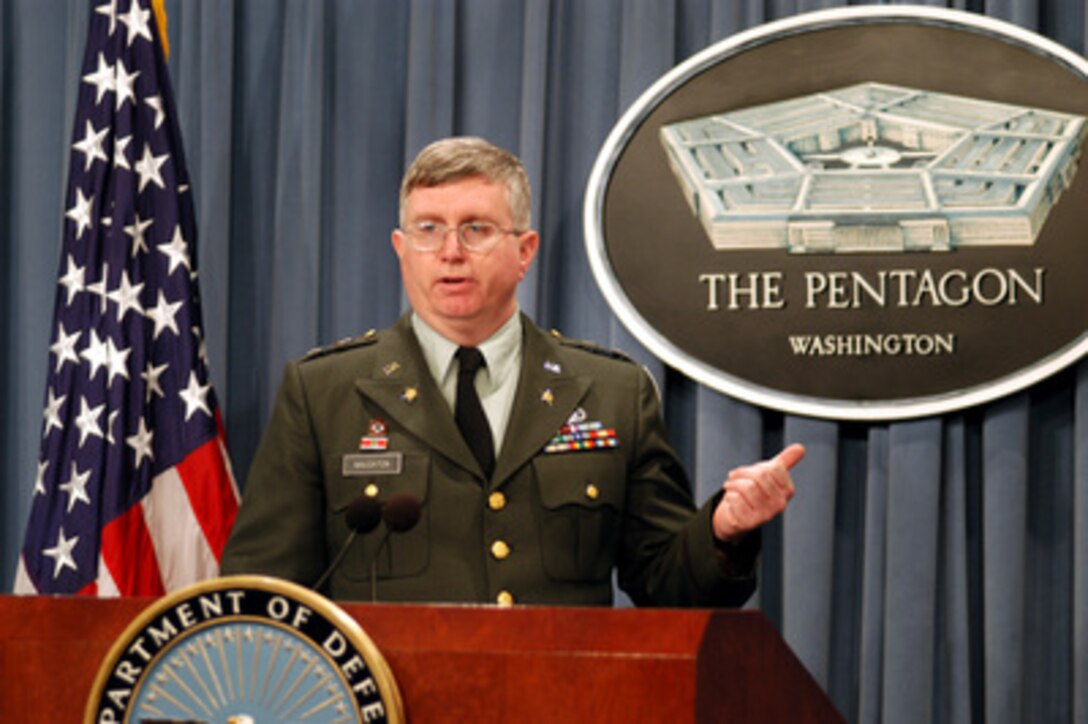 Army Col. James Naughton, Army Material Command, explains to reporters the military uses of depleted uranium during a Pentagon press briefing on March 14, 2003. Naughton was joined by Deputy Director of the Deployment Health Support Directorate Dr. Michael Kilpatrick who briefed reporters on its minimal impact on health and the environment. 
