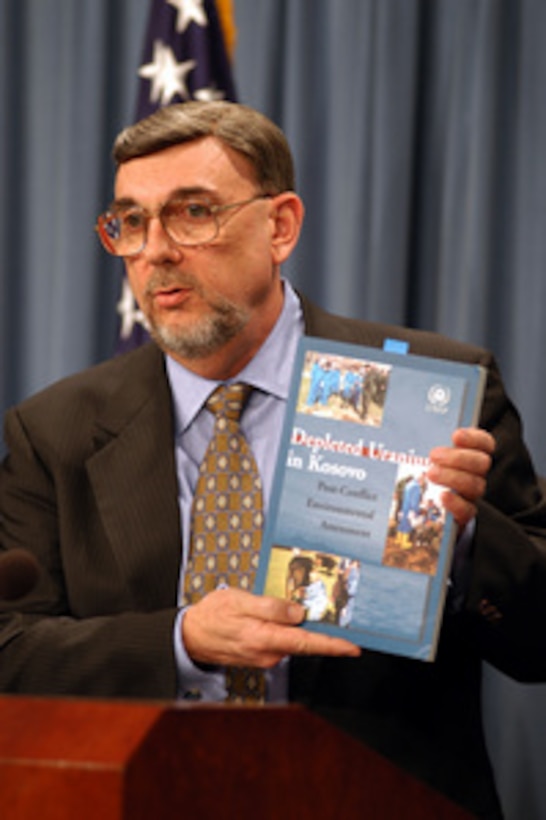 Deputy Director of the Deployment Health Support Directorate Dr. Michael Kilpatrick shows a copy of a depleted uranium study done in Kosovo during a Pentagon press briefing on March 14, 2003. Kilpatrick and Army Col. James Naughton, Army Material Command, briefed reporters on the military uses of depleted uranium and its minimal impact on health and the environment. 