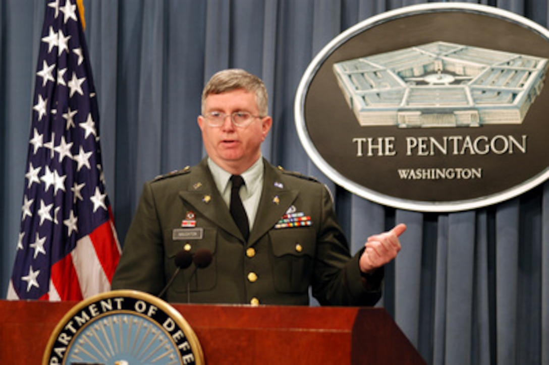 Army Col. James Naughton, Army Material Command, explains to reporters the military uses of depleted uranium during a Pentagon press briefing on March 14, 2003. Naughton was joined by Deputy Director of the Deployment Health Support Directorate Dr. Michael Kilpatrick who briefed reporters on its minimal impact on health and the environment. 