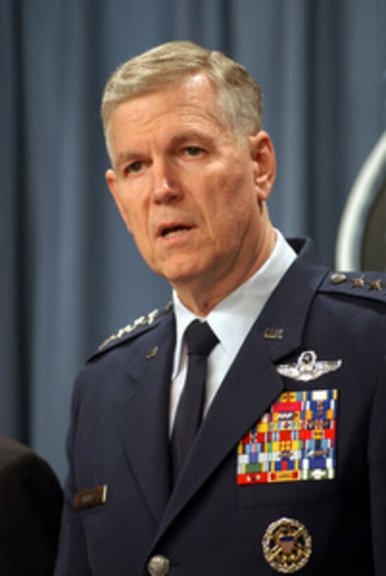 Chairman of the Joint Chiefs of Staff Gen. Richard B. Myers, U.S. Air Force, answers a reporter's question on the first actions against Iraq in support of Operation Iraqi Freedom during a Pentagon press briefing on March 20, 2003. Myers and Secretary of Defense Donald H. Rumsfeld updated reporters on last night's rapid strike on a target of opportunity in Baghdad. 