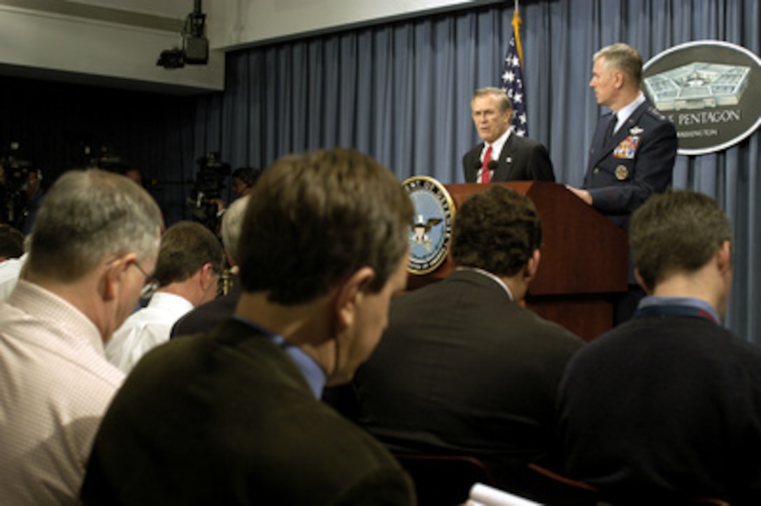 Secretary of Defense Donald H. Rumsfeld answers a reporter's question on the first actions against Iraq in support of Operation Iraqi Freedom during a Pentagon press briefing on March 20, 2003. Rumsfeld and Chairman of the Joint Chiefs of Staff Gen. Richard B. Myers, U.S. Air Force, updated reporters on last night's rapid strike on a target of opportunity in Baghdad. 