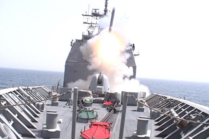 A Tomahawk missile is fired aboard USS Cowpens (CG-63) on approximately March 21, 2003. This was one of the first missiles launched by Navy Lt. Eric I. Palmer at the beginning of Operation Iraqi Freedom. Palmer, the officer-in-charge of Civil Affairs Team 6, Detachment 1, 2nd Battalion, 11th Marine Regiment, Regimental Combat Team 5 has been aiding the Iraqis in Haqlaniyah, Iraq, with reconstruction projects. ::r::::n::