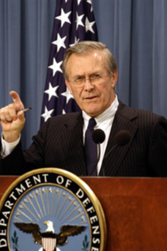 Secretary of Defense Donald H. Rumsfeld responds to a reporter's question during a Pentagon press briefing on March 25, 2003. Rumsfeld and Chairman of the Joint Chiefs of Staff Gen. Richard B. Myers, U.S. Air Force, updated reporters on the progress of Operation Iraqi Freedom. Operation Iraqi Freedom is the multinational coalition effort to liberate the Iraqi people, eliminate Iraq's weapons of mass destruction and end the regime of Saddam Hussein. 