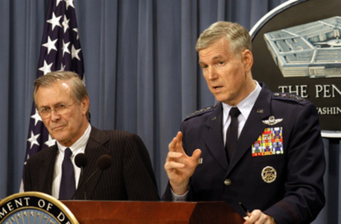 Chairman of the Joint Chiefs of Staff Gen. Richard B. Myers, U.S. Air Force, explains an operational detail to reporters during a Pentagon press conference with Secretary of Defense Donald H. Rumsfeld on March 25, 2003. Myers and Rumsfeld updated reporters on the progress of Operation Iraqi Freedom. Operation Iraqi Freedom is the multinational coalition effort to liberate the Iraqi people, eliminate Iraq's weapons of mass destruction and end the regime of Saddam Hussein. 