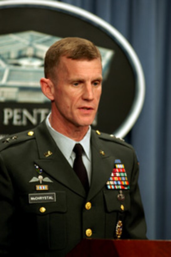 Maj. Gen. Stanley A. McChrystal, U.S. Army, answers a reporter's question during a Pentagon press conference on March 26, 2003. McChrystal and Assistant Secretary of Defense for Public Affairs Victoria Clarke briefed reporters on the progress of Operation Iraqi Freedom, which is the multinational coalition effort to liberate the Iraqi people, eliminate Iraq's weapons of mass destruction and end the regime of Saddam Hussein. McChrystal is the vice director for Operations, J-3, the Joint Staff. 