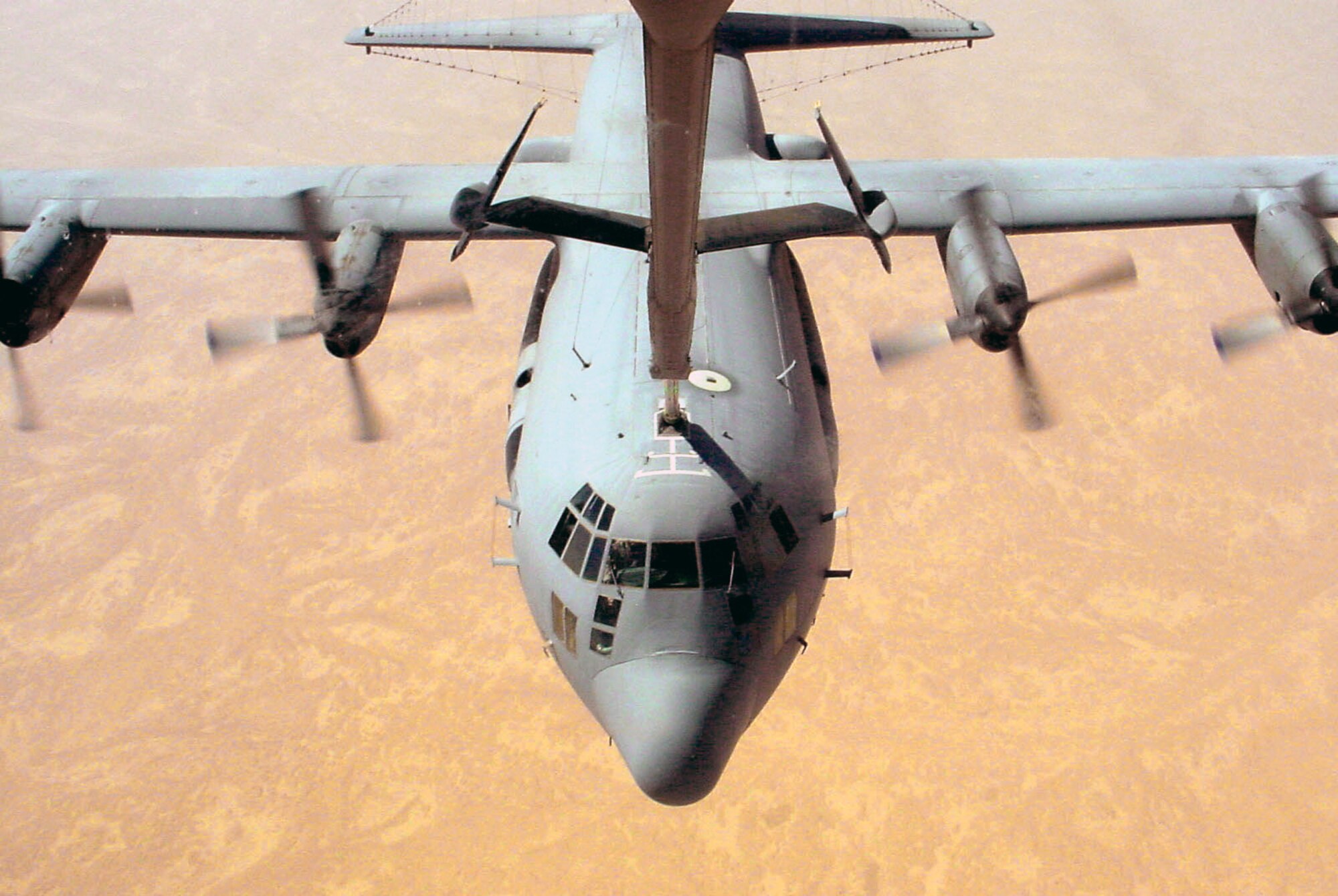 OPERATION IRAQI FREEDOM (AFPN) -- An EC-130H Compass Call aircraft from the 41st Expeditionary Electronic Combat Squadron refuels while flying a mission over Iraq during Operation Iraqi Freedom.  Squadron airmen will return home soon to Davis-Monthan Air Force Base, Ariz.  (U.S Air Force photo by Master Sgt. Luis Drummond)