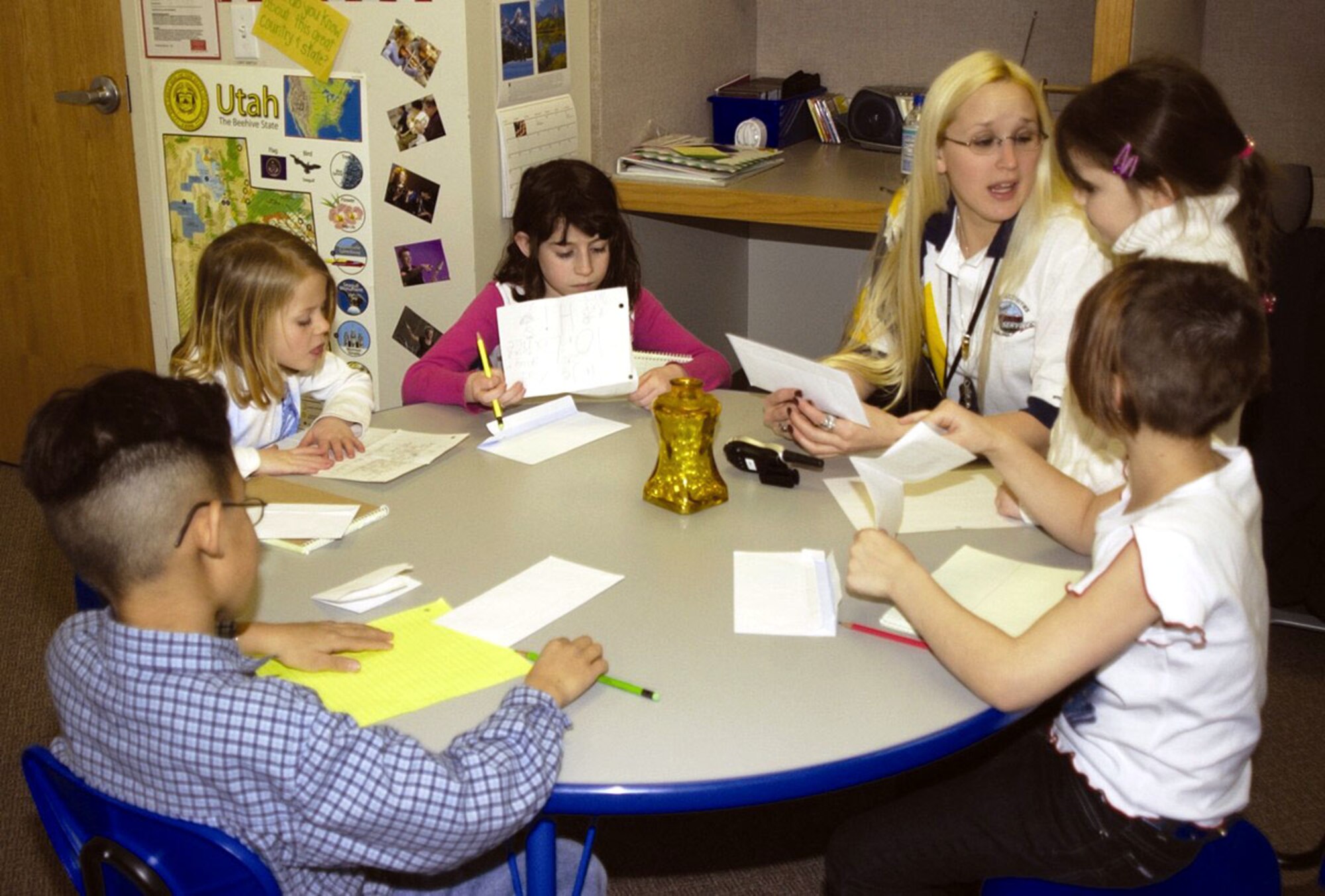 HILL AIR FORCE BASE, Utah -- Children write letters as part of the "Journey Around the World" program sponsored by the youth center here.  Letter writers get the chance to make friends with others their age who live on Air Force bases worldwide.  (Courtesy photo)