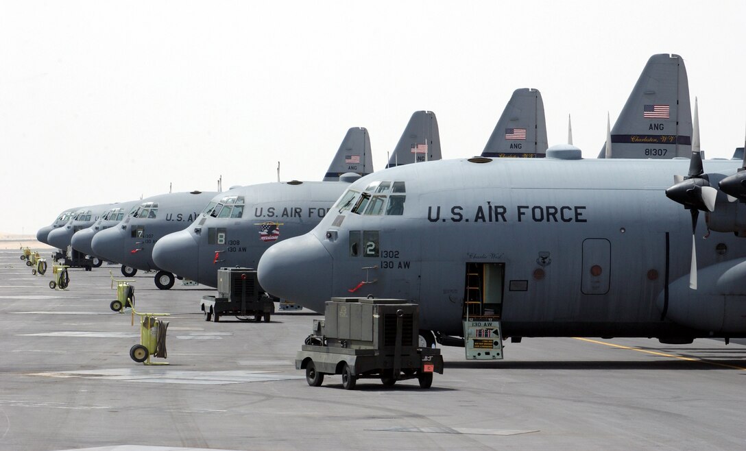 OPERATION IRAQI FREEDOM -- C-130 Hercules sit on the ramp at a forward-deployed location supporting stabilization efforts inside Iraq.  The aircraft are from the West Virginia Air National Guard's 130th Airlift Wing at Charleston.  (U.S. Air Force photo by Master Sgt Terry L. Blevins)