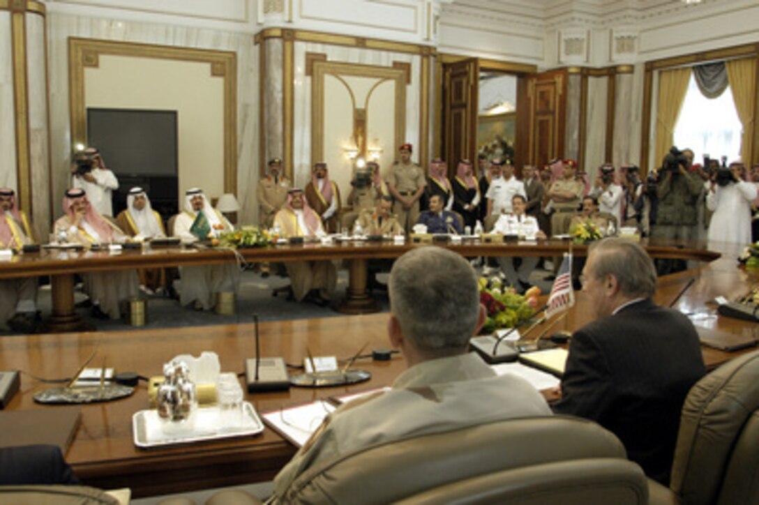 Secretary of Defense Donald H. Rumsfeld (right, foreground) and Army Gen. Tommy Franks, commander of U.S. Central Command, take part in bilateral meetings with Minister of Defense and Aviation Prince Sultan bin Abd al-Aziz Al Saud in Riyadh, Saudi Arabia, on April 29, 2003. Rumsfeld is visiting the troops and senior leadership in the Persian Gulf region. 